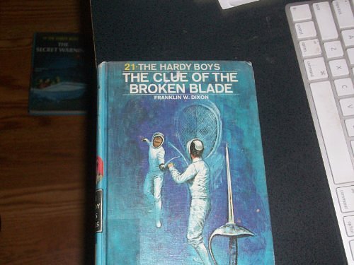 Cover Art for 9780448189215, The Clue of the Broken Blade (Hardy Boys, Book 21) by Franklin W. Dixon