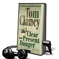 Cover Art for 9781441804105, Clear and Present Danger [With Earbuds] (Playaway Adult Fiction) by Tom Clancy