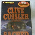 Cover Art for 9781593552114, Sacred Stone (Oregon Files Series) by Clive Cussler, Craig Dirgo