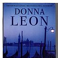 Cover Art for 9780871139375, Through a Glass, Darkly: A Commissario Guido Brunetti Mystery by Donna Leon