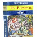 Cover Art for 9780460066303, THE BORROWERS AFIELD by Mary Norton